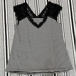 Black and white striped top with lace shoulder straps.